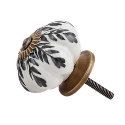Pomello in ceramica bianco con foglie nere e accessori in metallo
