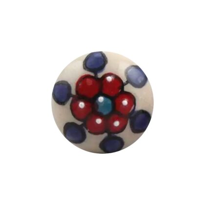 Pomello in ceramica FBK-43 color avorio con fiore rosso centrale, petali blu e piccoli dettagli bianchi