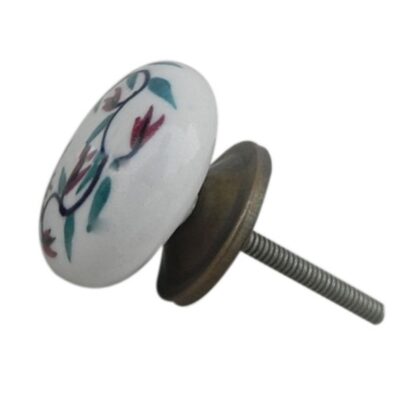 Pomello in ceramica bianca con decoro floreale bordeaux e verde, vista angolata