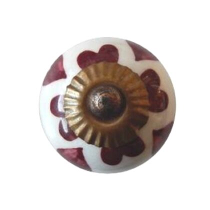 Vista frontale del pomello bianco in ceramica con cuori bordeaux