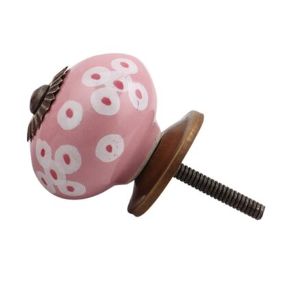 Pomello in ceramica rosa con pois bianchi e accessori in metallo