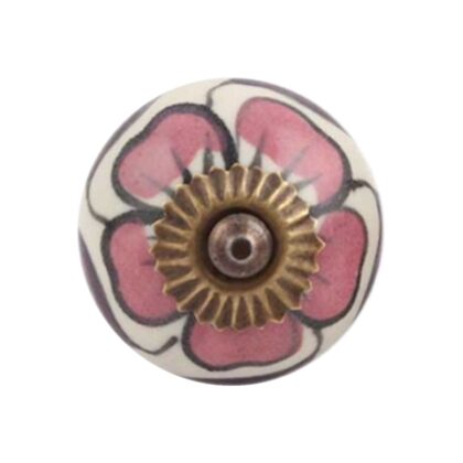 Pomello floreale in ceramica rosa e viola visto frontalmente