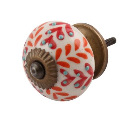Pomello in ceramica rosso e arancio con decorazione floreale