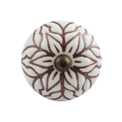 Pomello floreale in ceramica bianco e marrone visto frontalmente