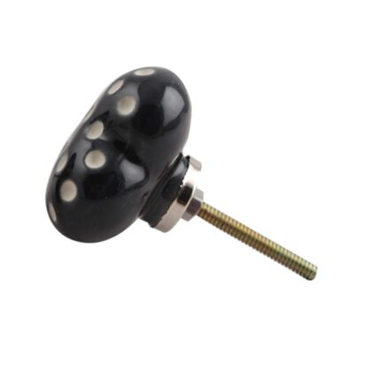 Pomello a cuore nero con pois bianchi in ceramica, vista angolata