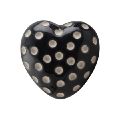 Vista frontale del pomello a cuore nero con pois bianchi